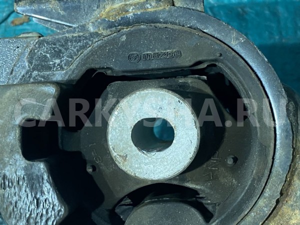 Опора двигателя левая Mazda CX-7 I (2006—2009) Mazda 2 оригинальный номер EH1439070