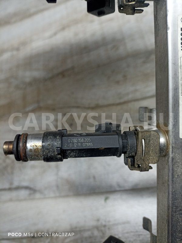 Топливная рейка Opel Astra J (2009—2012) Opel Astra оригинальный номер 55565971