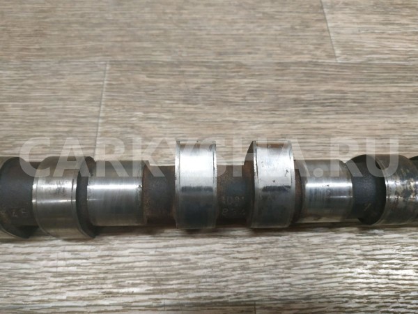 Распредвал выпускной Volvo S40 оригинальный номер 1271801